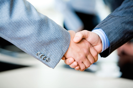 Close-up of two businessmens handshake